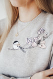 "Birdie" izšūto detaļu džemperis